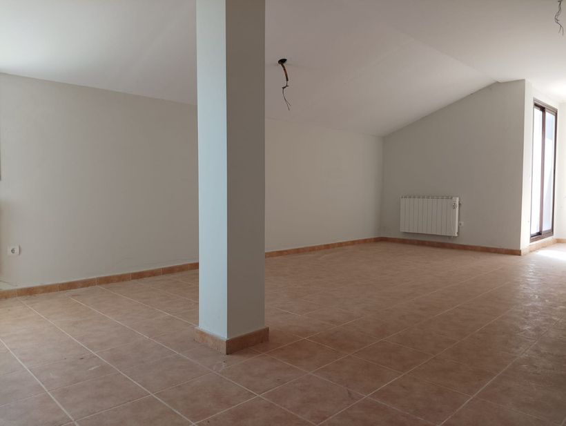 Salón del piso en venta de Unicaja