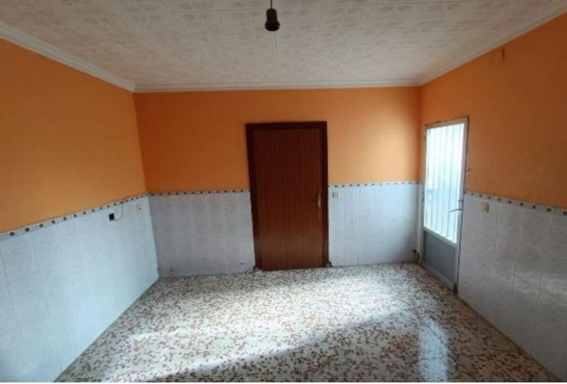 habitación de la casa en venta de CaixaBank