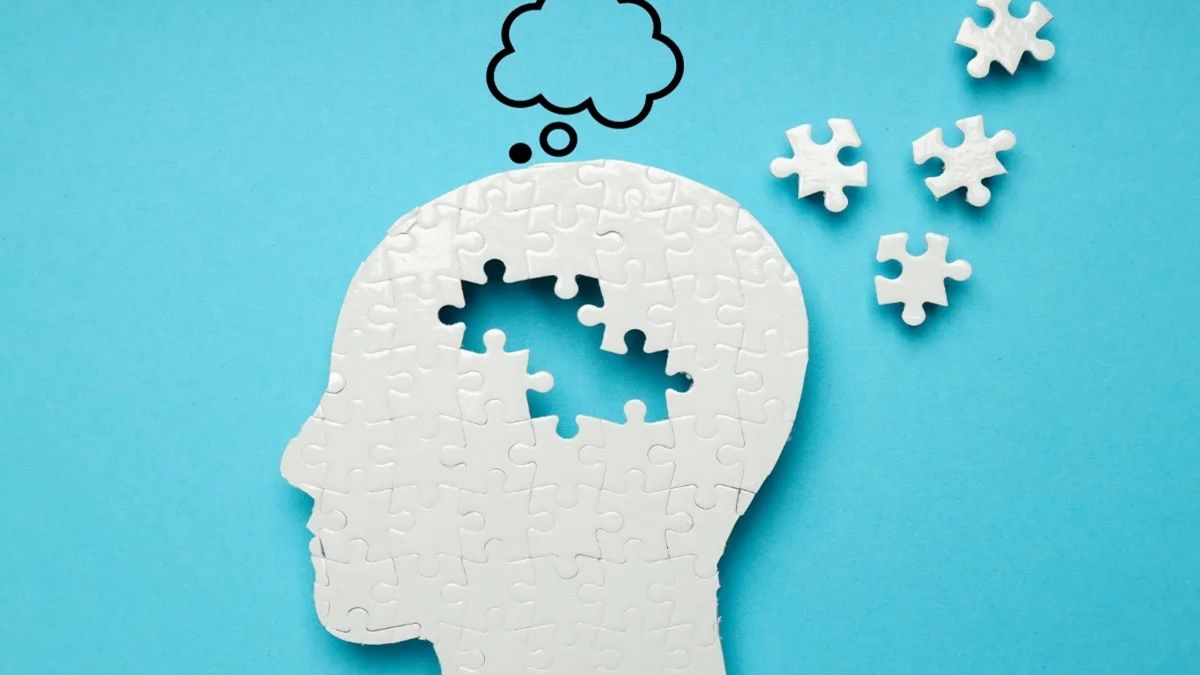 Una cabeza a la que le faltan algunas piezas. Puzzle