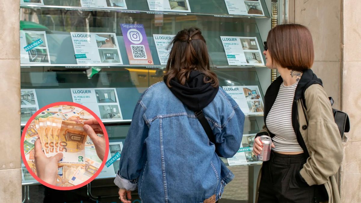 Jóvenes en el escaparate de una inmobiliaria Jóvenes en el escaparate de una inmobiliaria