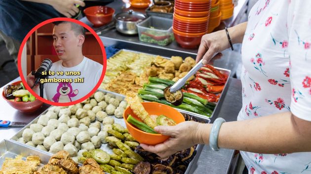 Propietario del restaurante sobre una foto de un buffet