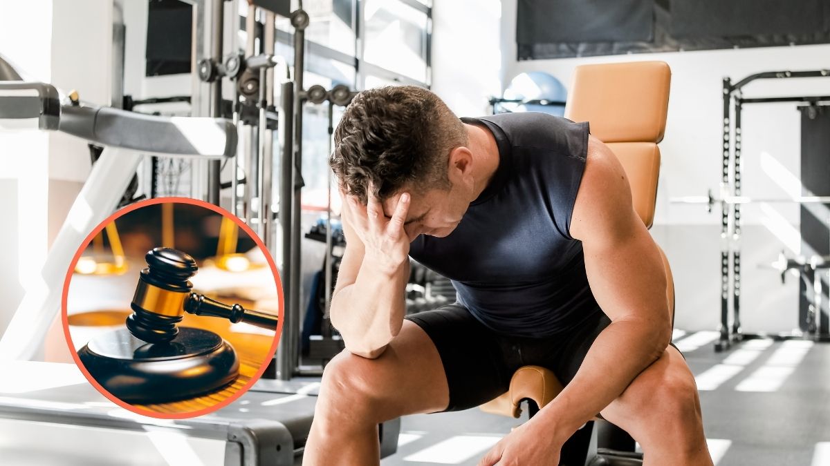 Un hombre con dolor en el gimnasio