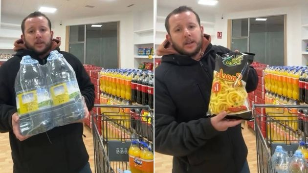 Miguel en su tienda enseñando productos