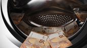 Una lavadora con billetes de euro en su interior