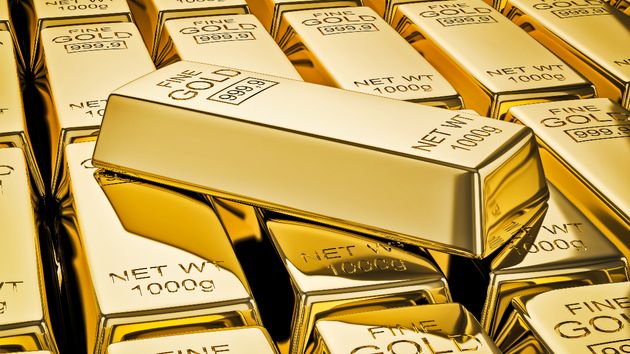 Lingotes brillantes de oro