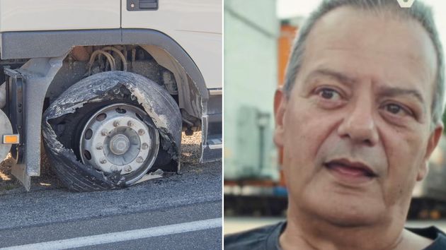 una rueda de camión reventada y el camionero